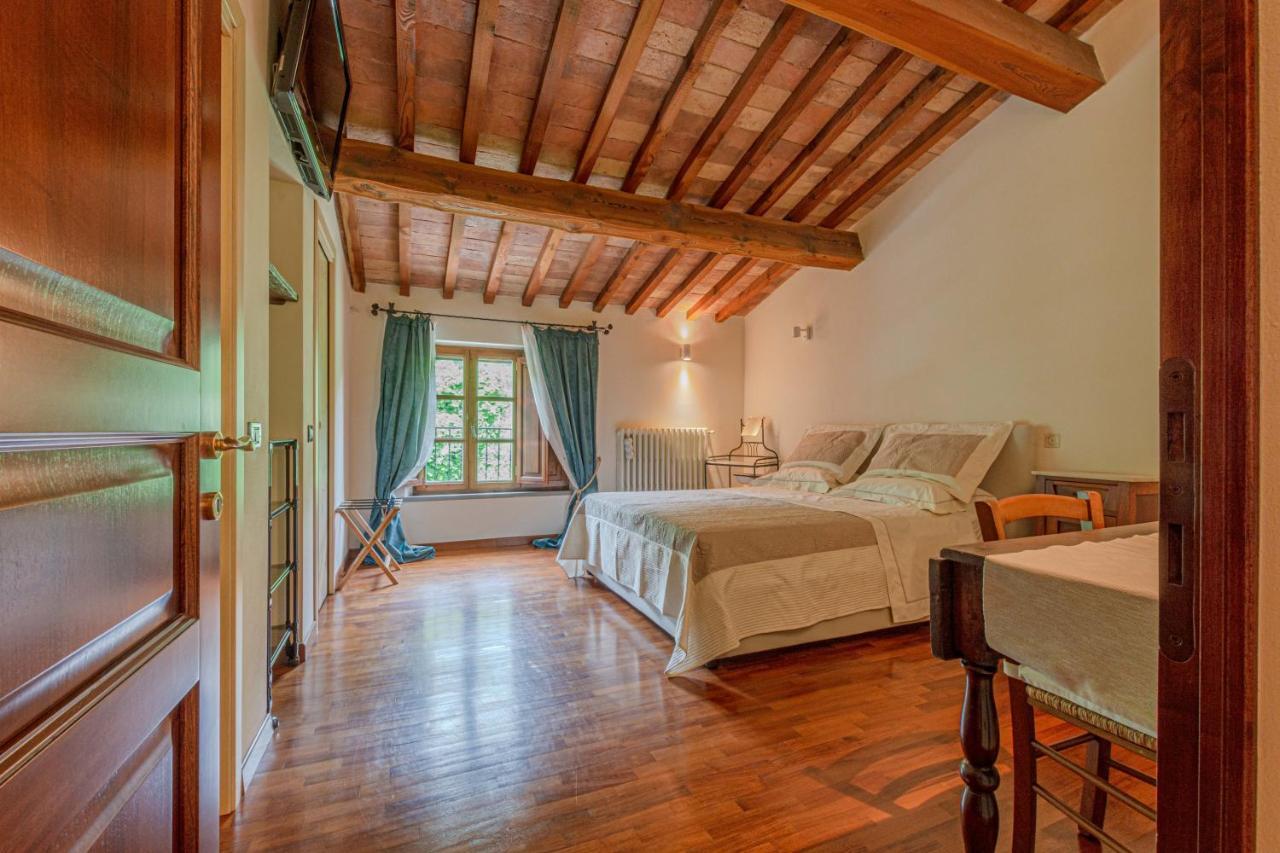 Appartamento Casa Bici Chianni Esterno foto
