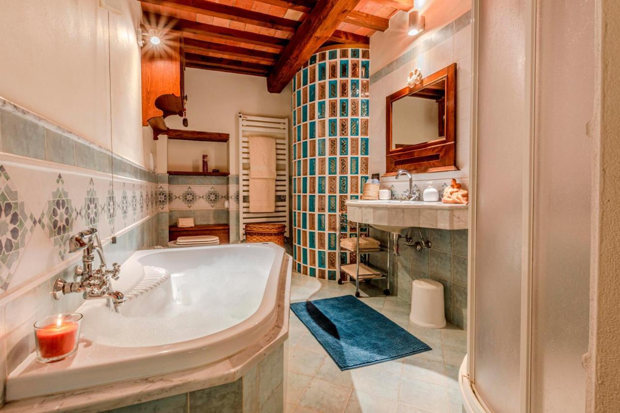 Appartamento Casa Bici Chianni Esterno foto