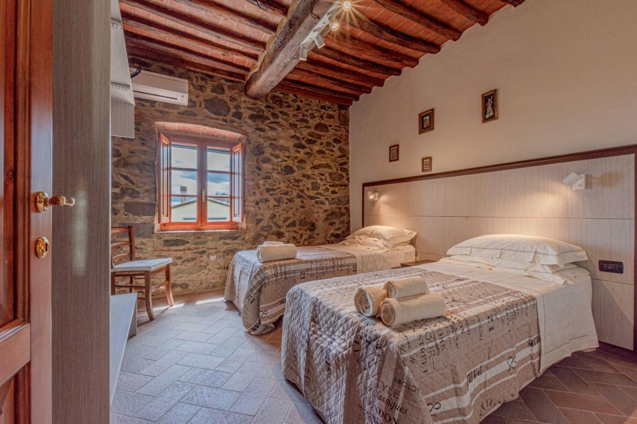 Appartamento Casa Bici Chianni Esterno foto