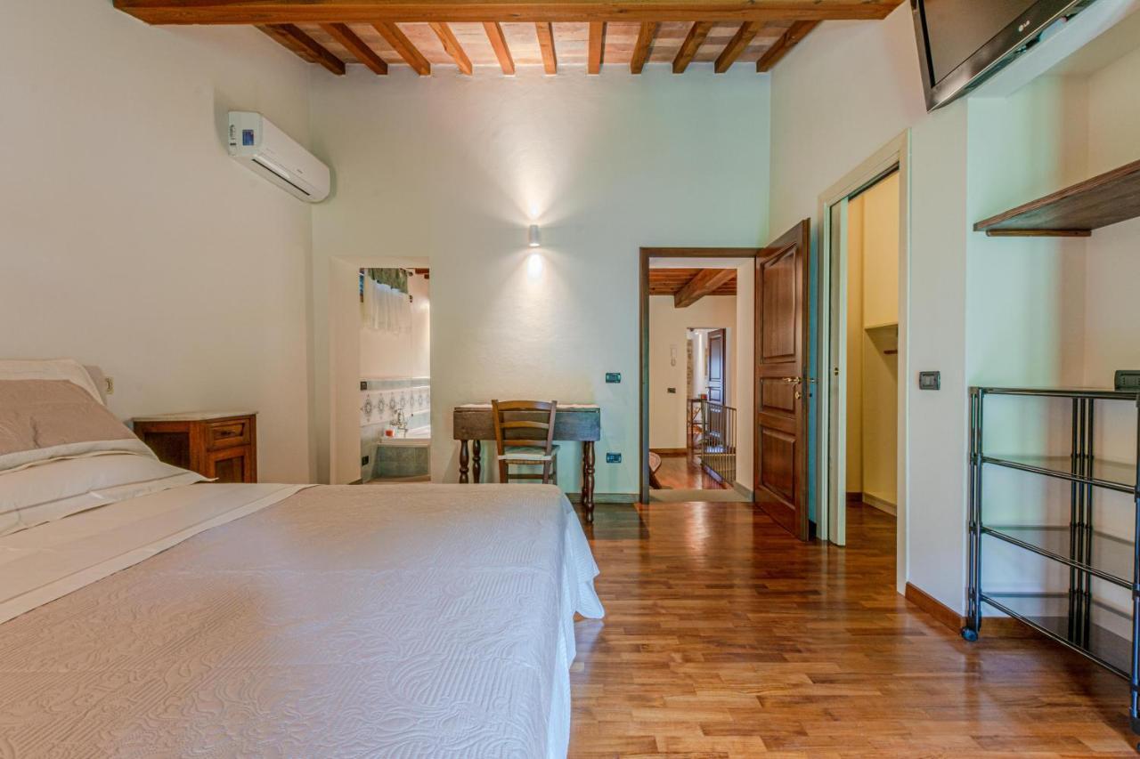 Appartamento Casa Bici Chianni Esterno foto